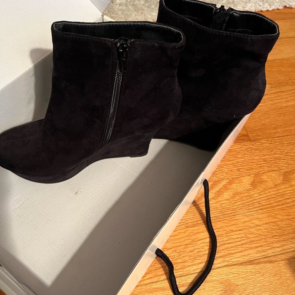 Nine West black suede platform side zip bootie.